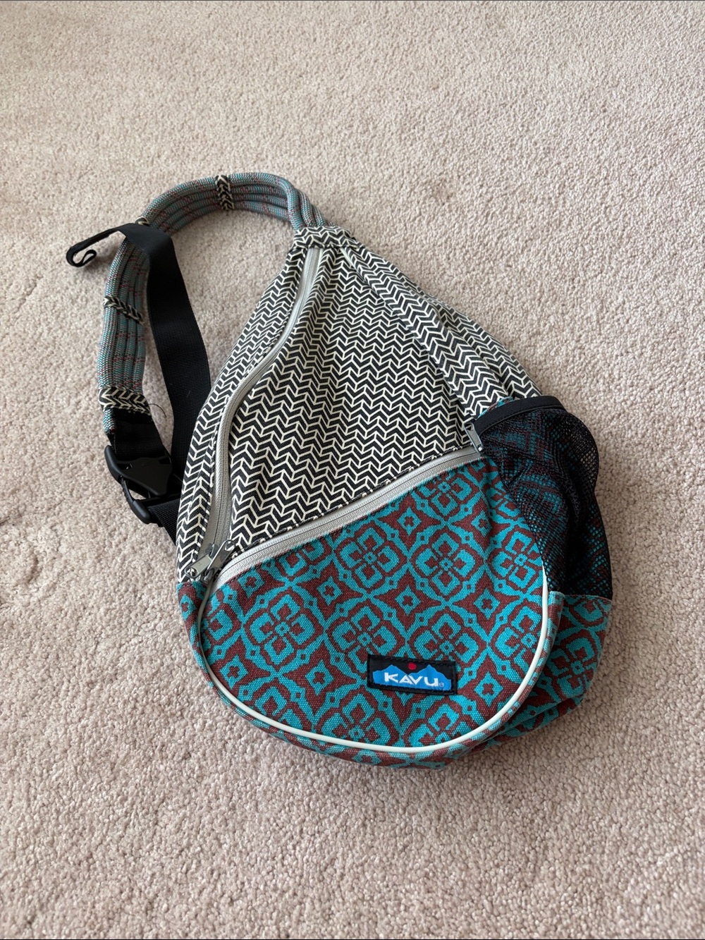 Kavu Teal and Brown Patterned Crossbody Sling Bag with Black Chevron Top
